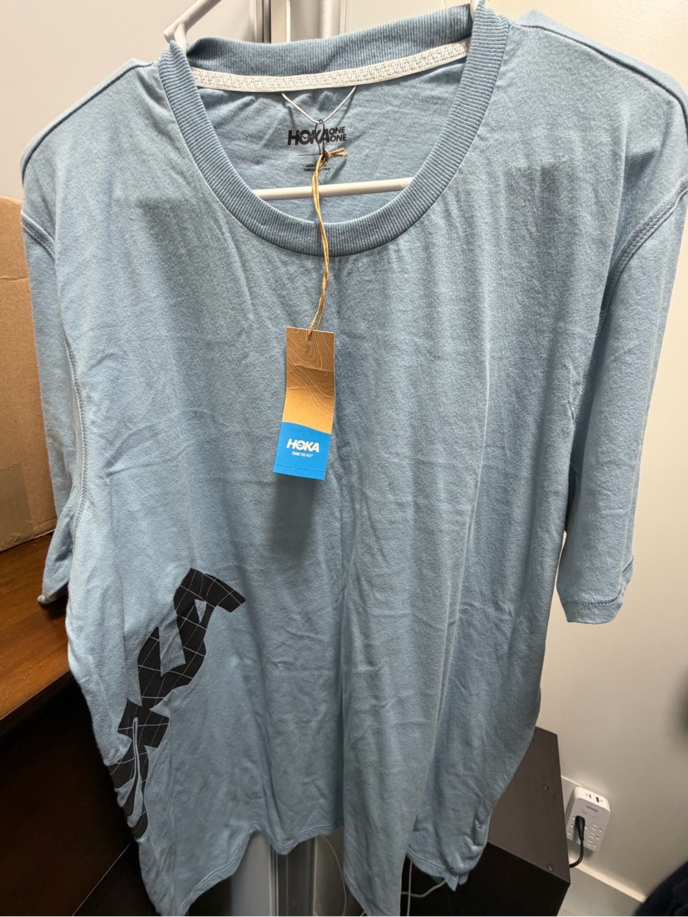NWT Hoka Light Blue Short Sleeve Crew Neck Tee with Black Graphic